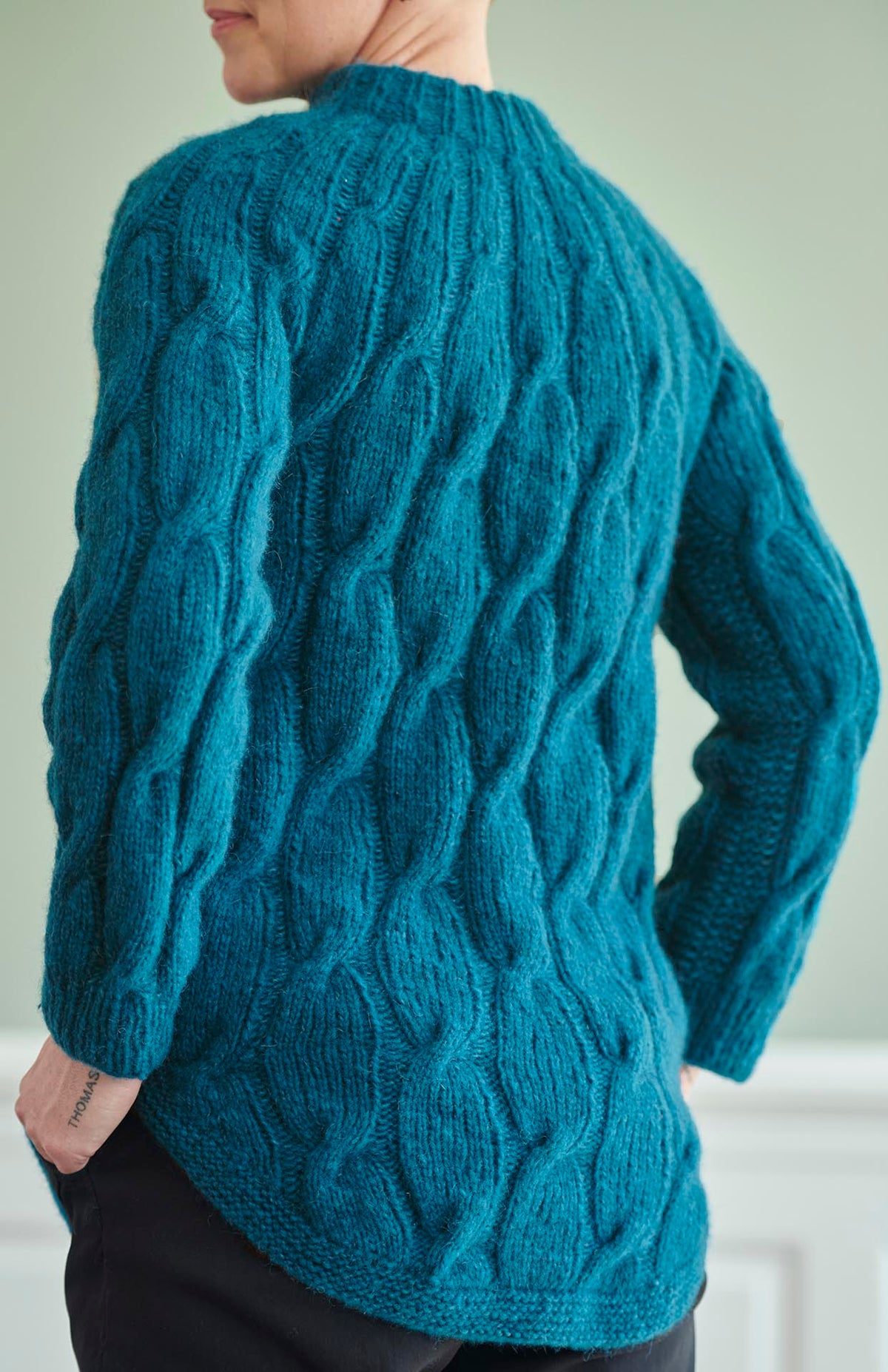 FR40 - Sweater poncho med snoninger Opskrift