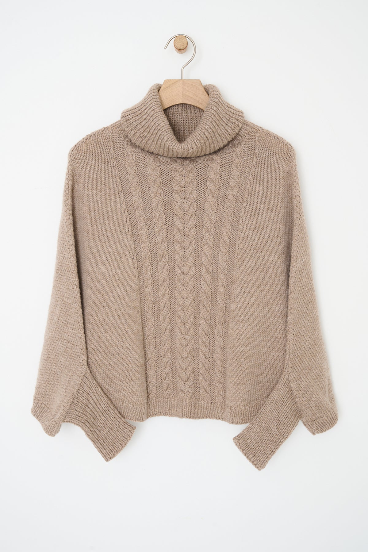 Poncho med ærmer