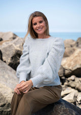Sweater med rynkede ærmekupler